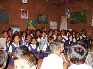 The Village children at the evening all-faith religious Prayers